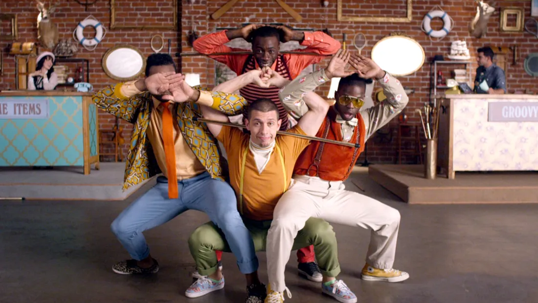 Performers in a colorful We The Economy musical short
